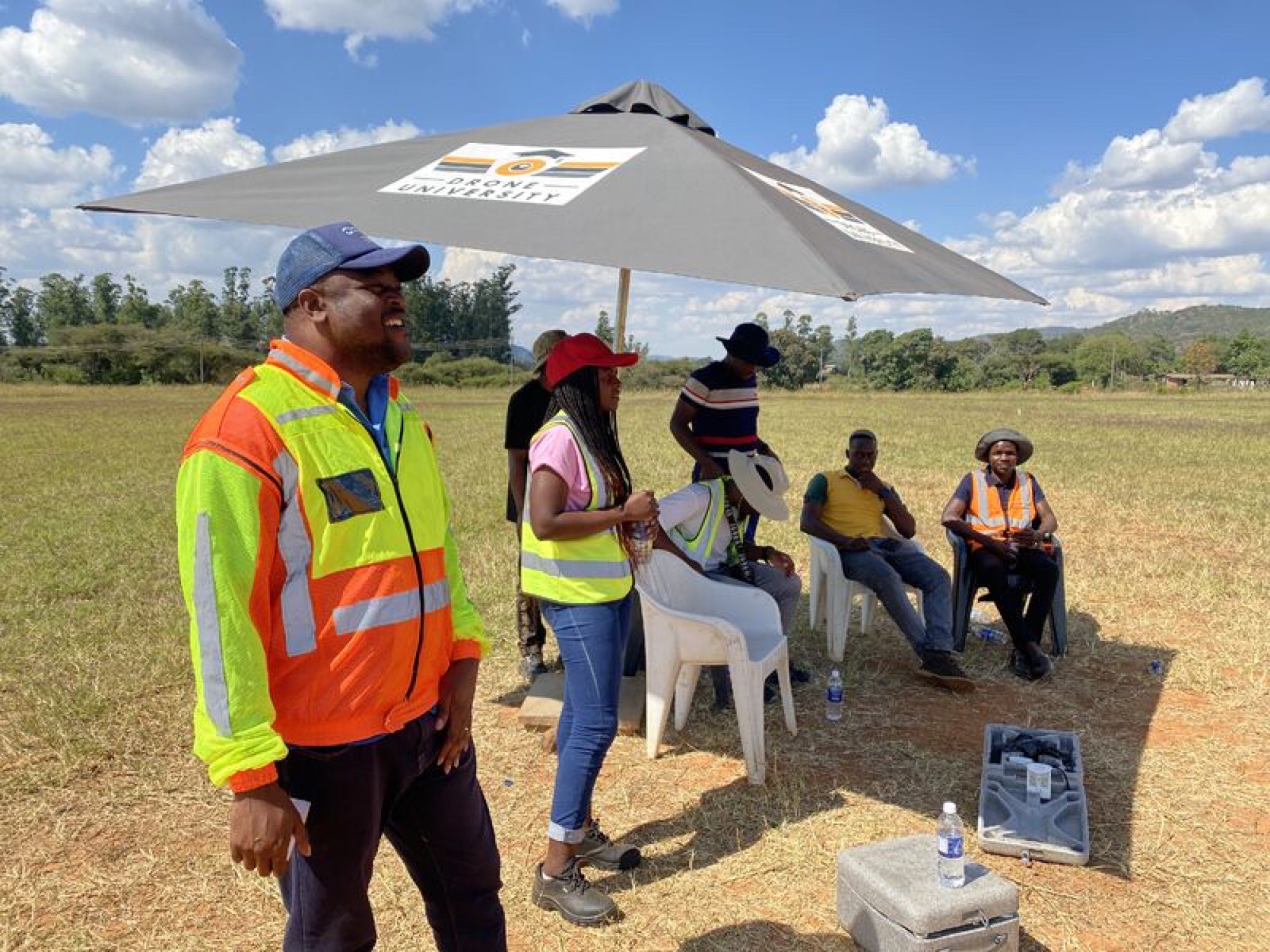 Drone University instructors and students during field training